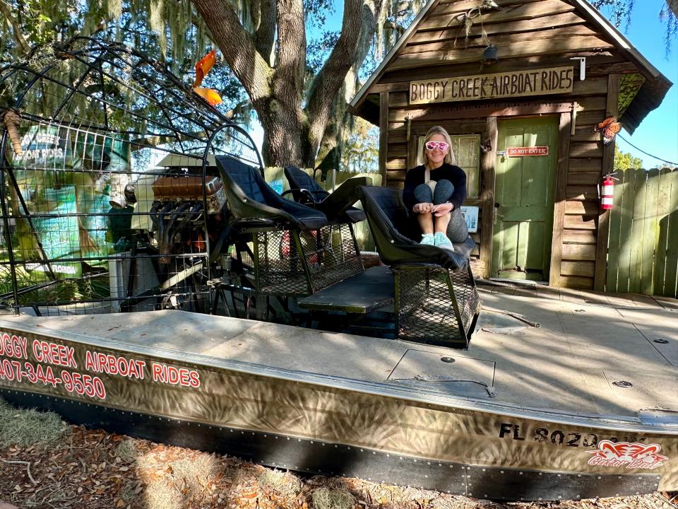 Terri Peters sitting on an airboat.