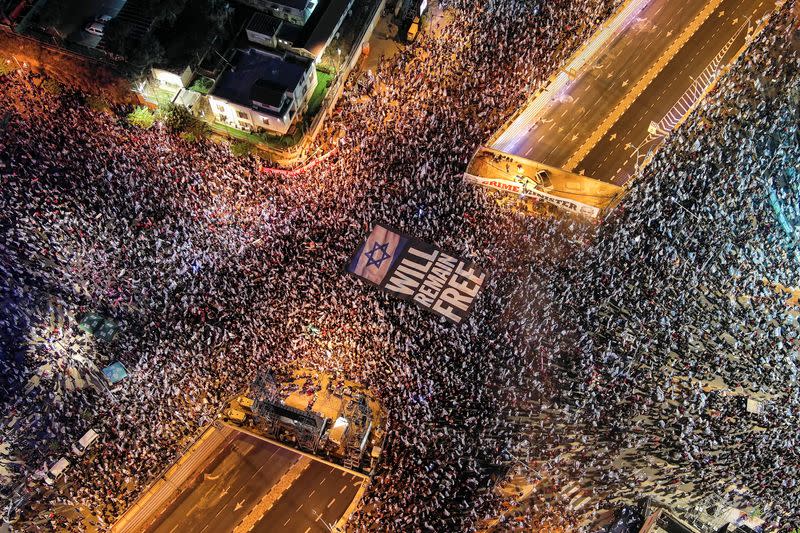 People demonstrate against Israeli Prime Minister Benjamin Netanyahu and his nationalist coalition government's judicial overhaul, in Tel Aviv