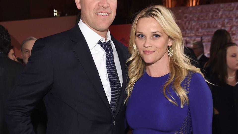 Jim Toth (L) and Reese Witherspoon attend Stand Up To Cancer's New York Standing Room Only, presented by Entertainment Industry Foundation, with donors American Airlines and Merck, chaired by Jim Toth, Reese Witherspoon &amp; MasterCard President/CEO Ajay Banga and his wife Ritu, honoring Katie Couric at Cipriani Wall Street on April 9, 2016 in New York City