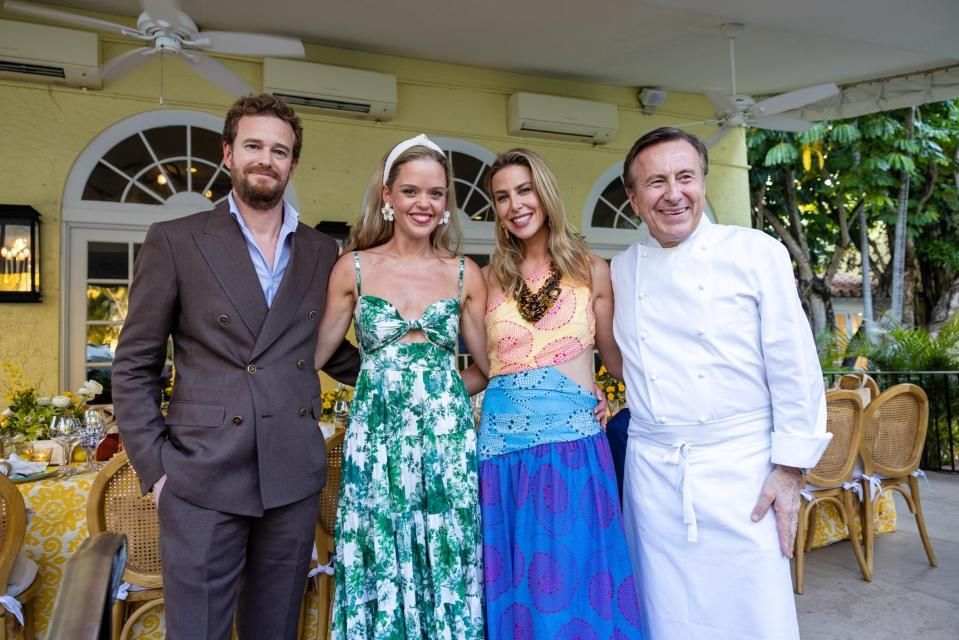 Bobby Schlesinger, Katherine Boulud, Courtney Schlesinger and Daniel Boulud pose during the event to celebrate the 20th anniversary of his eponymous Café Boulud and Katherine's birthday.