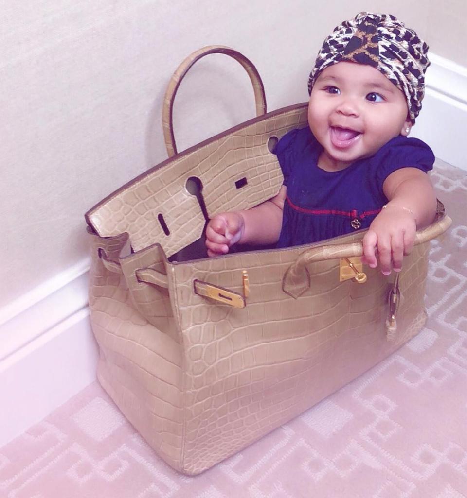 She’s ready to go! True hilariously climbed into Khloé’s purse, where she flashed her bright smile as Mom <a href="https://www.instagram.com/p/BqvQIRJg1ae/" rel="nofollow noopener" target="_blank" data-ylk="slk:snapped photos.;elm:context_link;itc:0;sec:content-canvas" class="link ">snapped photos.</a>