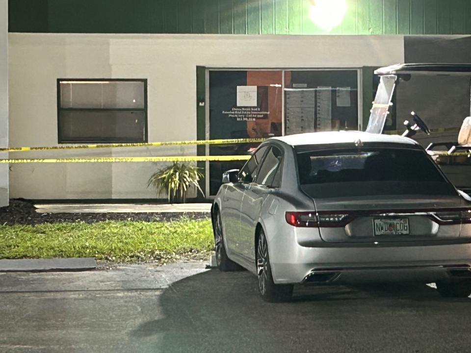 Crime scene investigators and Indian River County Sheriff's Office deputies can be seen outside a office area of American Golf Club, 100 Woodland Drive, south of Vero Beach, where officials said Monday evening a man was shot and killed and a woman arrested.