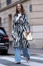 <p> We’re not sure where this stylish guest was off to and that’s the great thing about this look. Working for everywhere from the office to dinner and drinks, it’s proof a great coat really is all you need to jazz up your wide leg jeans. </p>