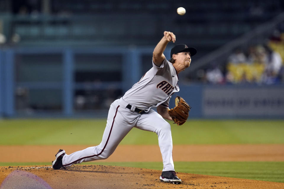 Arizona Diamondbacks starting pitcher Luke Weaver throws to a Los Angeles Dodgers batter during the first inning of a baseball game Tuesday, Sept. 14, 2021, in Los Angeles. (AP Photo/Marcio Jose Sanchez)