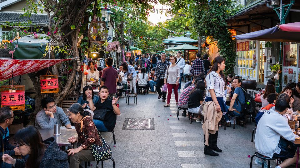 Tainan is known for its thriving street food scene. Pedestrian Fuzhong street is pictured here. - Keitma/Alamy Stock Photo