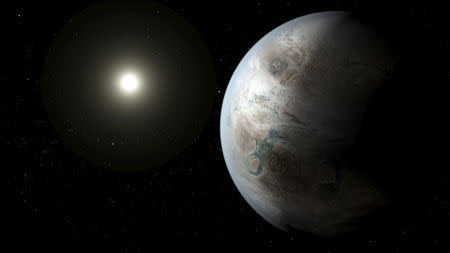 FILE PHOTO: An artist's concept depicts one possible appearance of the planet Kepler-452b, the first near-Earth-size world to be found in the habitable zone of star that is similar to our sun in this NASA image released on July 23, 2015. NASA/Ames/JPL-Caltech/T. Pyle/Handout via Reuters/File Photo