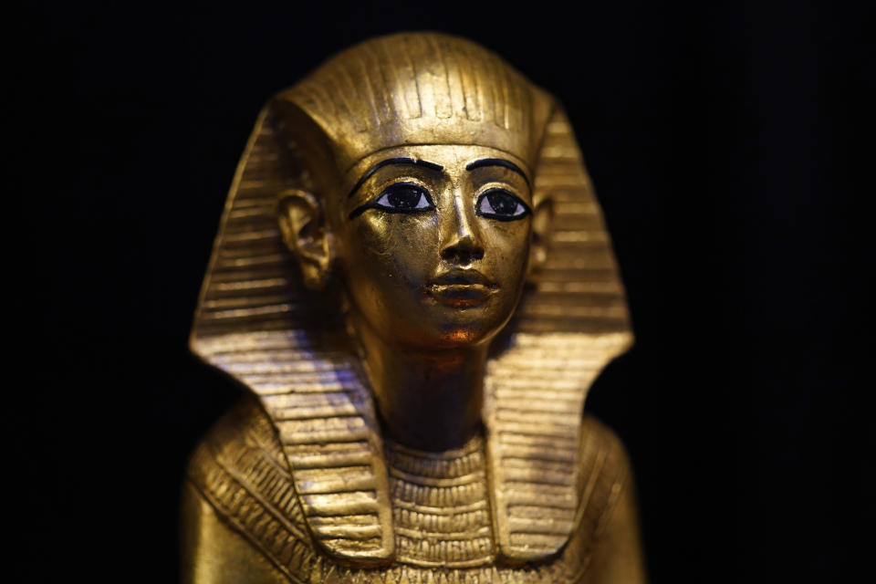 A replica of King Tut appears at the Beyond King Tut Immersive Experience gift shop, Thursday, Oct. 27, 2022, in New York. The exhibition will open to the public on Friday, in commemoration of the the 100th anniversary of the discovery of King Tut's tomb on Nov. 4, 1922. (AP Photo/Julia Nikhinson)