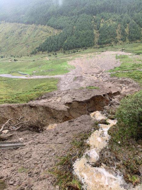 Landslips on the A83 after heavy rain washed an estimated 6,000 tonnes of soil and rock off the hillside (PA)