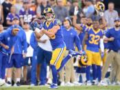 September 27, 2018; Los Angeles, CA, USA; Los Angeles Rams wide receiver Cooper Kupp (18) catches a pass and runs the ball for a touchdown against the Minnesota Vikings during the first half at the Los Angeles Memorial Coliseum. Mandatory Credit: Gary A. Vasquez-USA TODAY Sports