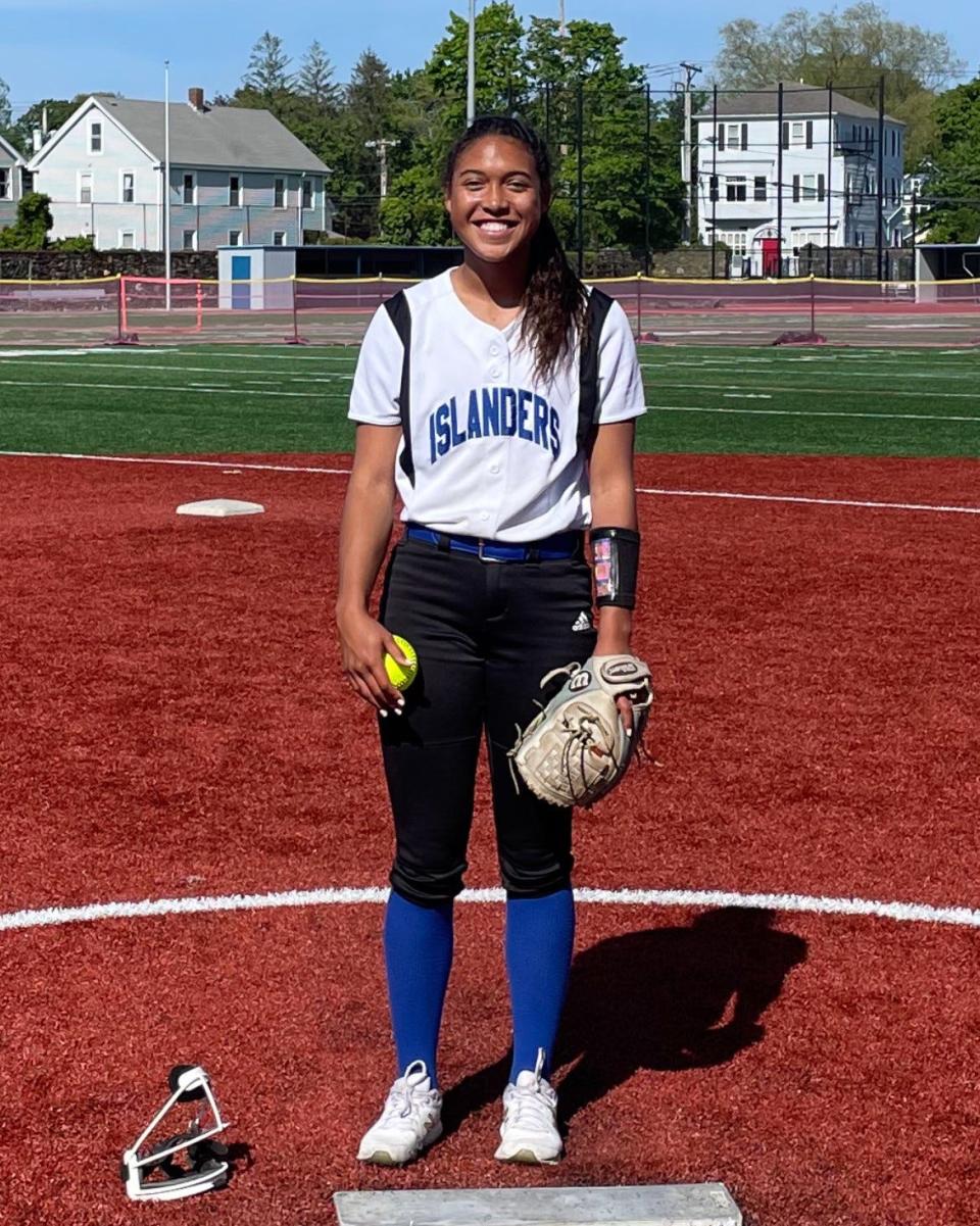 Karissa Dupuis of Middletown is all smiles after she surpassed the 200-strikeout mark for the season Thursday against Rogers.