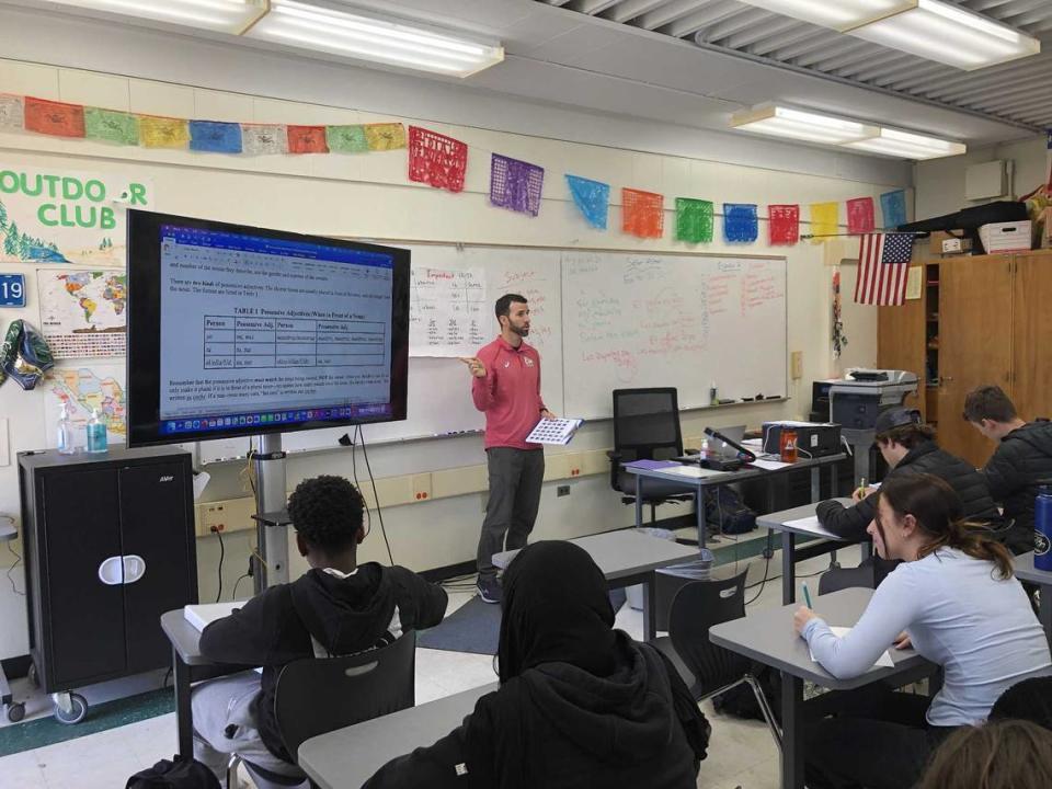 Teacher Brian Asher runs Spanish 2 exercises after lunch at Rio Americano High School on Friday, March 24, 2023. On March 14, Asher set foot in North Korea for approximately eight minutes, completing his personal goal of traveling to every country in the world.