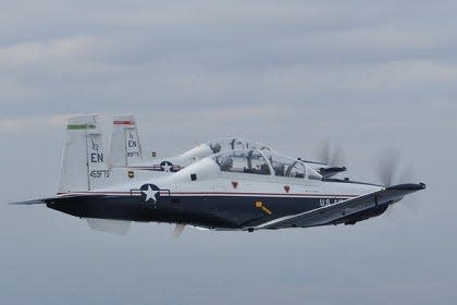 The T-6A Texan II is a single-engine, two-seater aircraft designed to train joint primary pilot training students in basic flying skills common to U.S. Air Force and Navy pilots.