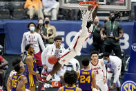 Alabama's Juwan Gary (4) dunks the ball against LSU during the second half of the championship game at the NCAA college basketball Southeastern Conference Tournament Sunday, March 14, 2021, in Nashville, Tenn. (AP Photo/Mark Humphrey)