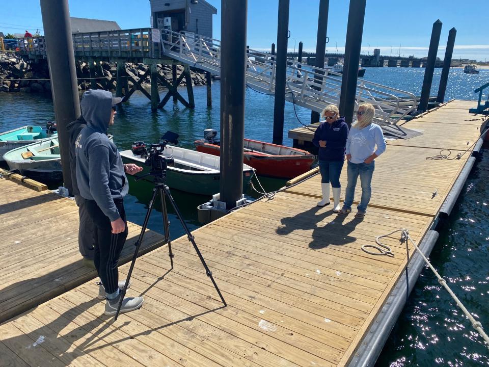 April Nicoll and Angel Eaton of Al Gauron Deep Sea Fishing filming a segment on their business for an episode of the show "Explore New England," which will air in October on NESN.