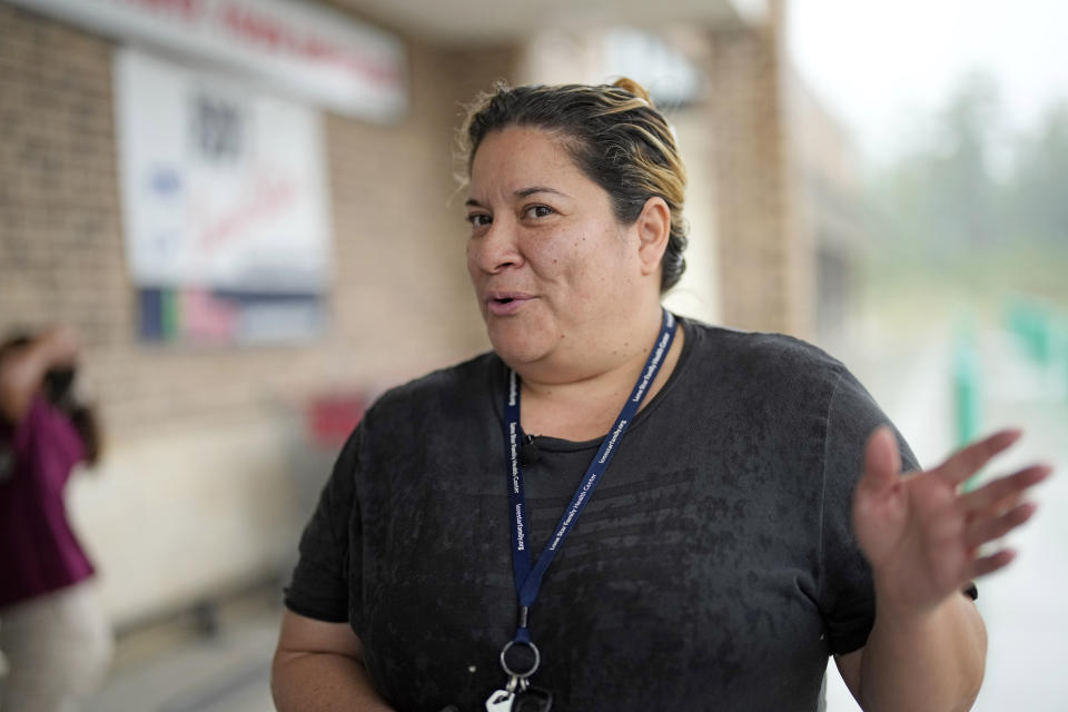 Zayda Cerrato talks about living in the Santa Fe subdivision of the Colony Ridge development Tuesday, Oct. 3, 2023, in Cleveland, Texas. The booming Texas neighborhood is fighting back after Republican leaders took up unsubstantiated claims that it has become a magnet for immigrants living in the U.S. illegally and that cartels control pockets of the neighborhood. (AP Photo/David J. Phillip)