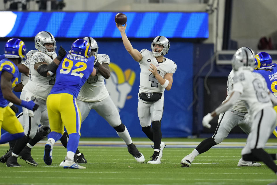 Las Vegas Raiders quarterback Derek Carr throws a pass during the second half of an NFL football game against the Los Angeles Rams Thursday, Dec. 8, 2022, in Inglewood, Calif. (AP Photo/Marcio Jose Sanchez)