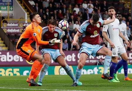 Soccer Football - Premier League - Burnley vs Chelsea - Turf Moor, Burnley, Britain - April 19, 2018 Burnley's Nick Pope, James Tarkowski and Kevin Long in action Action Images via Reuters/Andrew Boyers