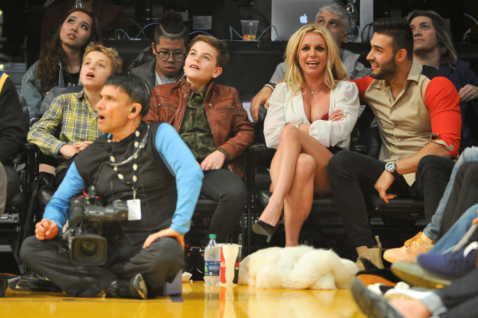 Sean Federline, Jayden James Federline, Britney Spears and Sam Asghari attend a basketball game between the Los Angeles Lakers and the Golden State Warriors at Staples Center on November 29, 2017 in Los Angeles, California