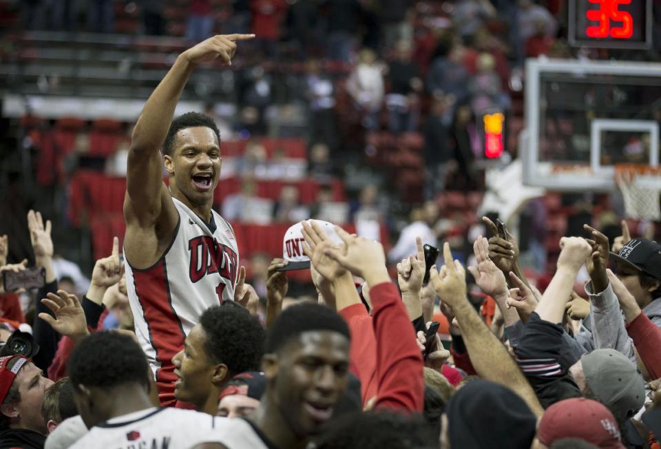 UNLV guard Rashad Vaughn celebrates a 71-67 victory over Arizona after an NCAA college basketball game Tuesday, Dec. 23, 2014, in Las Vegas. (AP Photo/Eric Jamison)