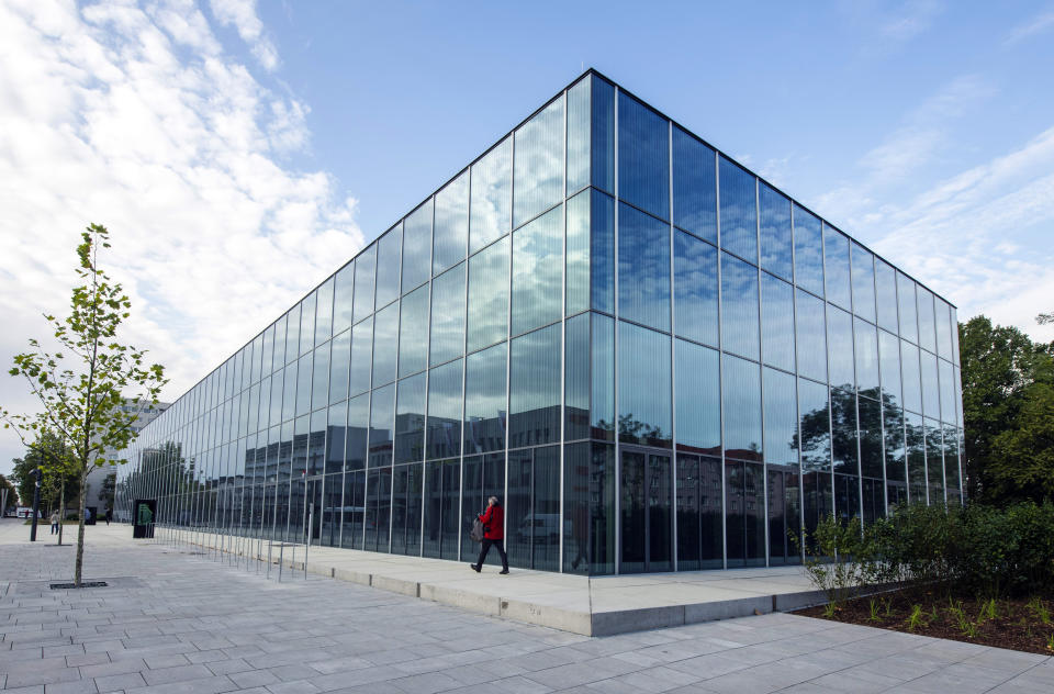 Clouds reflect in the fassade of the new Bauhaus Museum in Dessau, Germany, Saturday, Sept. 7, 2019. The collection of the Bauhaus Dessau Foundation comprises around 49,000 catalogued exhibits and is the second-largest collection worldwide on the theme of the Bauhaus. The official opening of the new Bauhaus Museum, built for the centenary of the founding of the Bauhaus, will take place on Sunday, Sept. 8, 2019. (AP Photo/Jens Meyer)