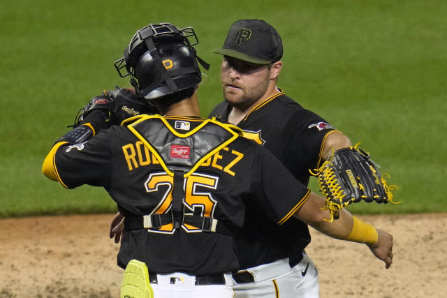 Pirates score 6 in 3rd to chase Strider and then hold off the Braves 7-6  after rain delay