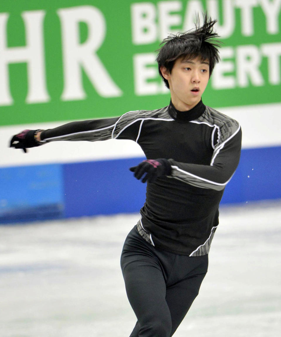 In this Monday, March 24, 2014 photo, Japanese teenager Yuzuru Hanyu practices ahead of the World Figure Skating Championships in Saitama, near Tokyo. Hanyu is aiming to add a world title to his Olympic gold medal when the world championships begin Wednesday.(AP Photo/Kyodo News) JAPAN OUT, MANDATORY CREDIT