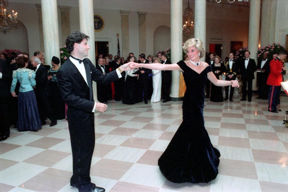 Princess Diana dancing with John Travolta at a White House dinner in 1985. The “Travolta Dress”, as it’s now know, recently went on display at Kensington Palace. Designed by Victor Edelstein, the midnight blue velvet dress featured off-the-shoulder straps, a floor-sweeping velvet skirt, a decorative bow and layers of tulle petticoats. The dress was bought by charity Historic Royal Palaces in December 2019 for£264,000 and has been in a specialist conservation facility since. (Shutterstock)