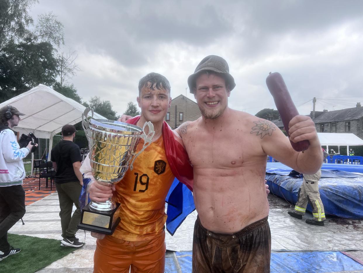 George Young and another competitor at the World Gravy Wrestling Championships (George Young/PA)