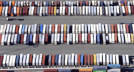 FILE PHOTO: Containers are seen stacked up at the ports of Los Angeles and Long Beach, California February 6, 2015 in this aerial image. REUTERS/Bob Riha Jr