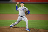 Texas Rangers starting pitcher Spencer Howard delivers during the fourth inning of a baseball game against the Baltimore Orioles, Friday, Sept. 24, 2021, in Baltimore. (AP Photo/Nick Wass)