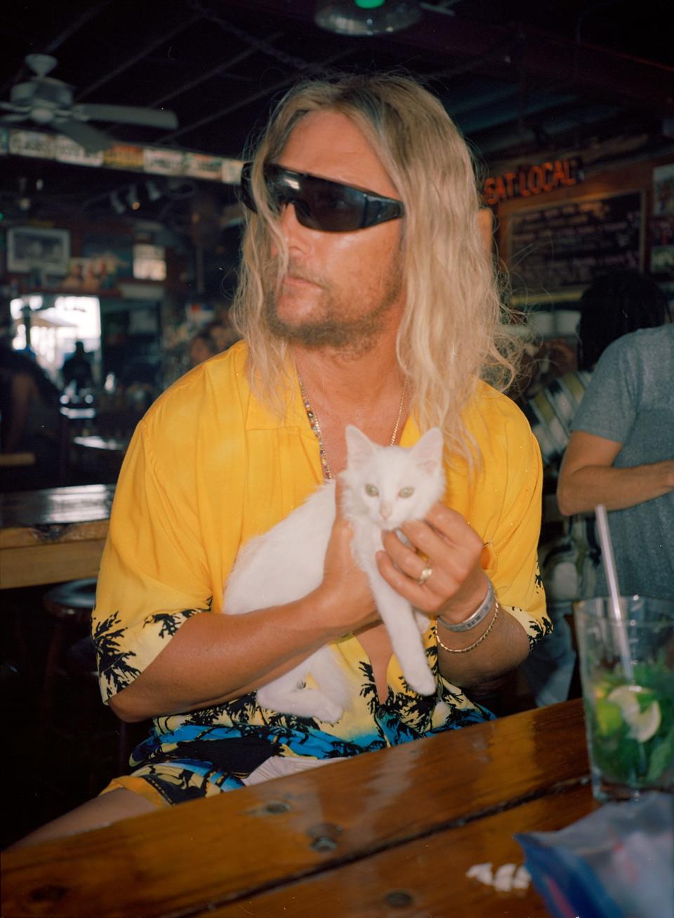 “The kitten is one of our early introductions to Moondog, the protagonist in the movie. He just happens upon this perfect white kitten, in a drunken, raw, on the dock—he's just like, stumbling drunk. He comes across this kitten, and it becomes his kind of, like, sidekick in the first segment of the film. You look at this dude, and he seems kind of like a wild street drunk, but then he has this kitten and you realize he's kind of, like, an amazing, innocent soul, you know?”