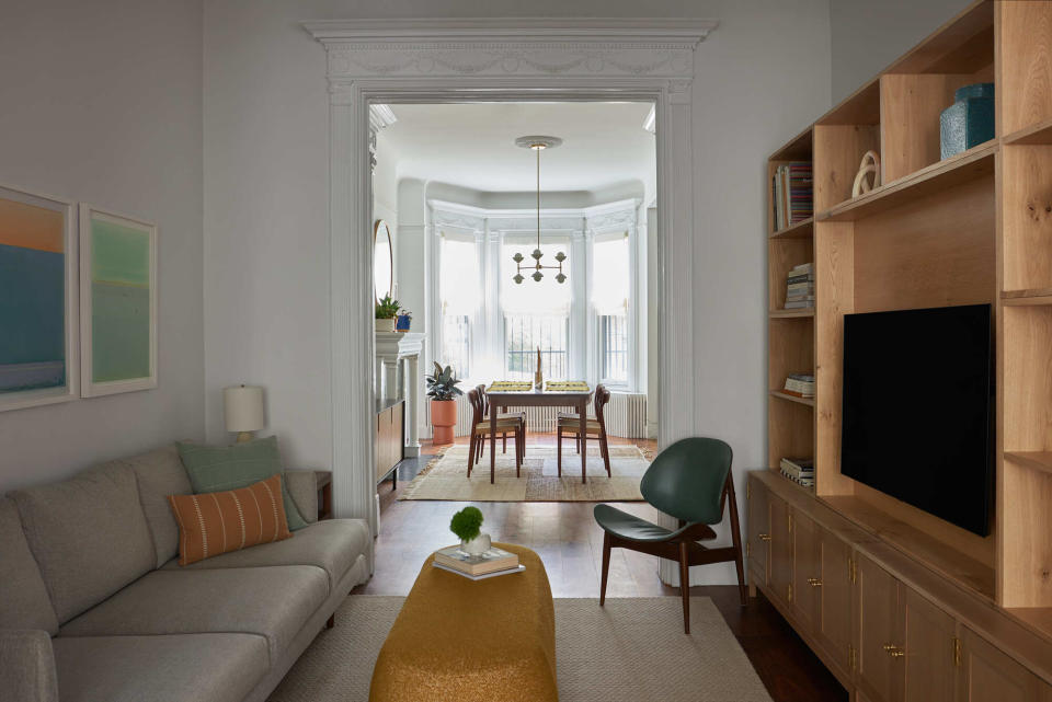 A living room with bulky media unit