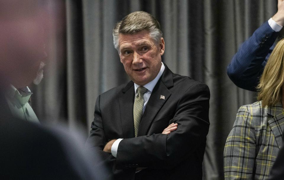 FILE - Mark Harris, Republican candidate in North Carolina's 9th Congressional race, talks during a recess in testimony during the second day of a public evidentiary hearing on the 9th congressional district voting irregularities investigation Tuesday, Feb. 19, 2019, at the North Carolina State Bar in Raleigh, N.C. In North Carolina's south-central 8th District, the six-candidate GOP field includes Harris and state Rep. John Bradford of Charlotte. (Travis Long/The News & Observer via AP, Pool, File)