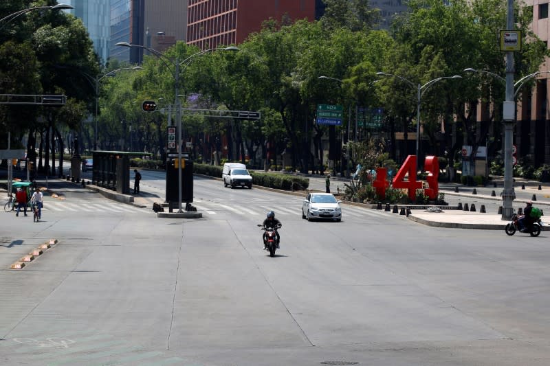 Few vehicles are seen on the street as the coronavirus disease (COVID-19) outbreak continues, in Mexico City