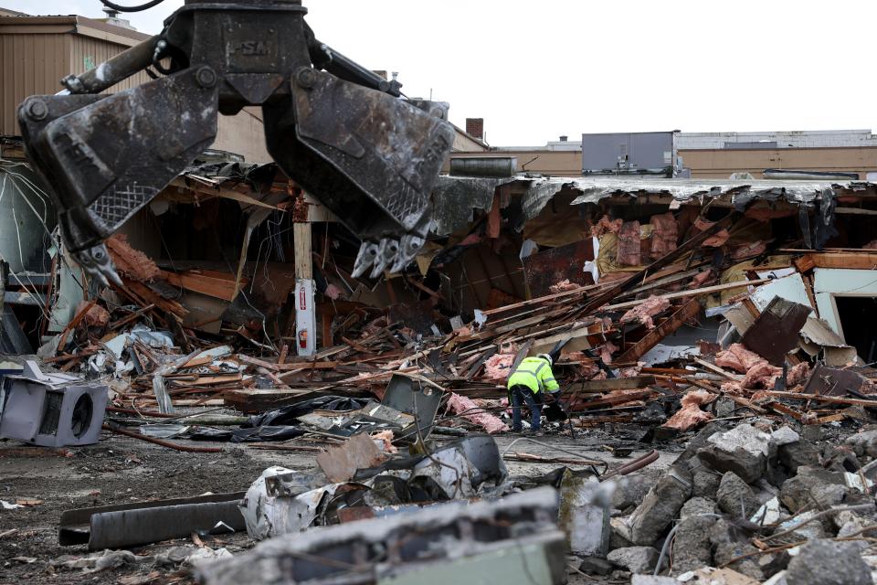 Crews demolish the former Union Gospel Mission in Salem on Thursday.