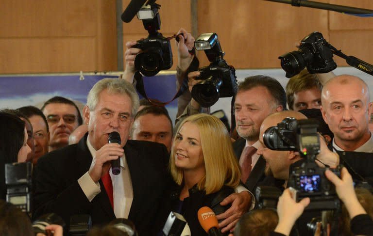 Czech new-elected President Milos Zeman (L) hugs his daughter Katerina during a press conference on January 26, 2013 in Prague. Zeman has been put under the microscope for alleged corruption over his links to former communist apparatchik Miroslav Slouf, suspected of mafia ties