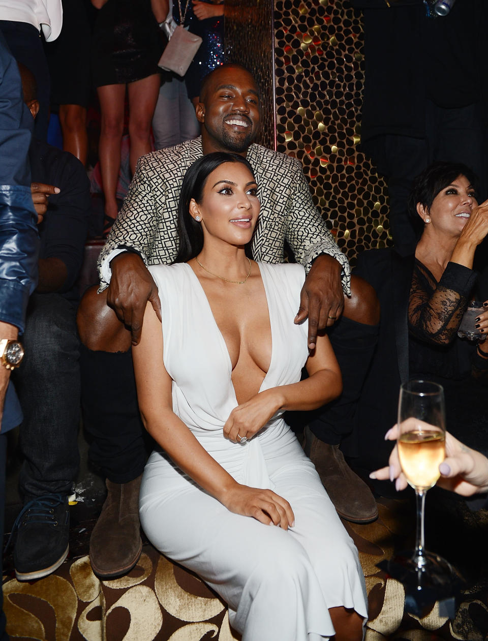 Kanye West helped Kim Kardashian celebrate her birthday at Tao nightclub at the Venetian in Las Vegas in 2014. He even smiled. (Photo: Getty Images)