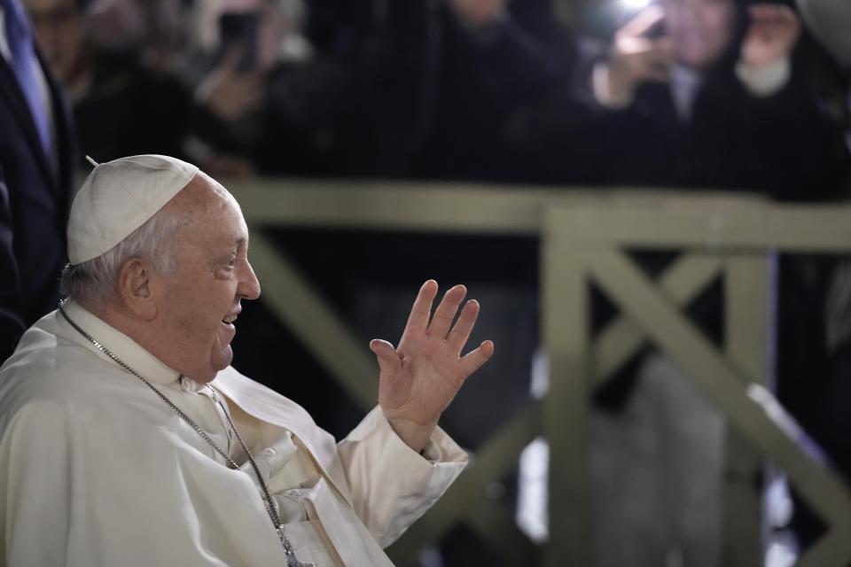 Pope Francis leaves St. Peter's Square after praying in front of the Nativity scene after celebrating a New Year's Eve vespers Mass in St. Peter's Basilica at the Vatican, Sunday, Dec. 31, 2023. (AP Photo/Andrew Medichini)