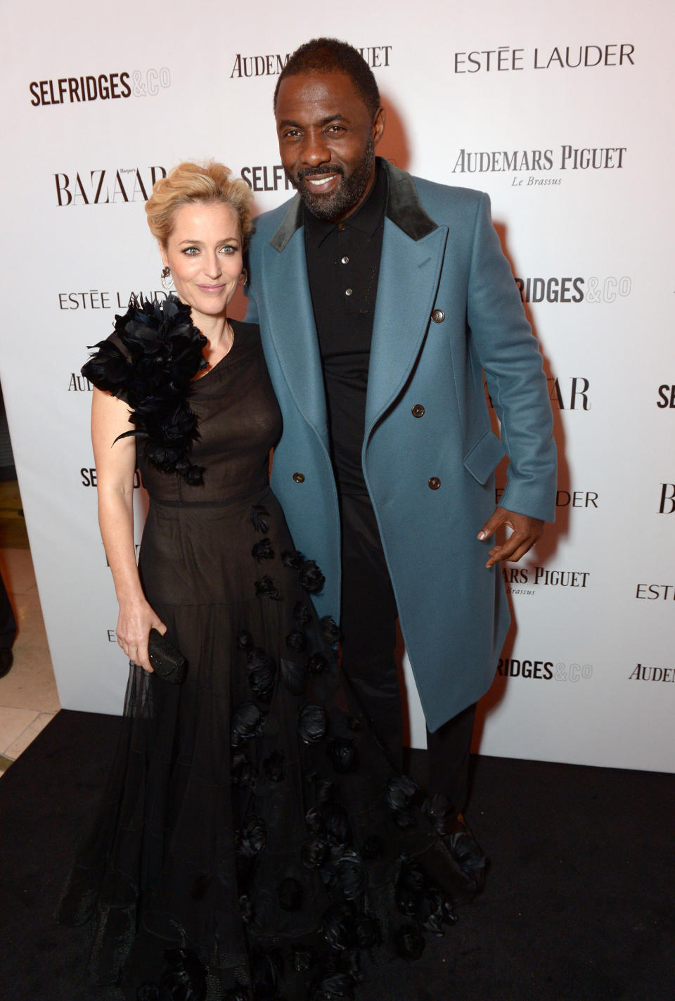 IMAGE DISTRIBUTED FOR HARPER'S BAZAAR - American actress Gillian Anderson and British actor Idris Elba attend Harper's Bazaar Women of the Year Awards 2013 at Claridge's Hotel on Tuesday, Nov. 5, 2013, in London. (Photo by Jon Furniss/Invision for Harper's Bazaar/AP)