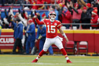Kansas City Chiefs quarterback Patrick Mahomes (15) reacts after a touchdown by tight end Travis Kelce during the first half of an NFL divisional playoff football game against the Houston Texans, in Kansas City, Mo., Sunday, Jan. 12, 2020. (AP Photo/Jeff Roberson)