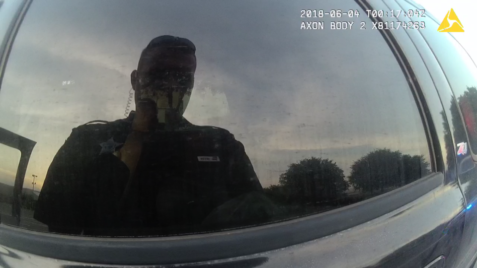 Former Jackson County Deputy Zachary Wester's reflection seen on his body camera footage.