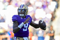 Washington quarterback Michael Penix Jr. looks to throw against Tulsa during the first half of an NCAA college football game Saturday, Sept. 9, 2023, in Seattle. (AP Photo/Lindsey Wasson)