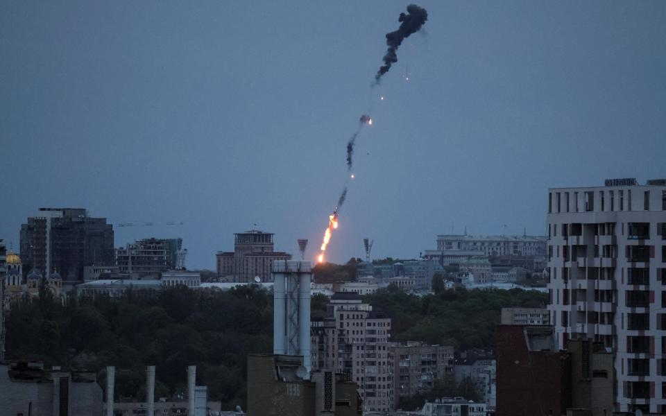 An explosion of a drone is seen in the sky over the city during a Russian drone strike, amid Russia's attack on Ukraine - GLEB GARANICH/REUTERS