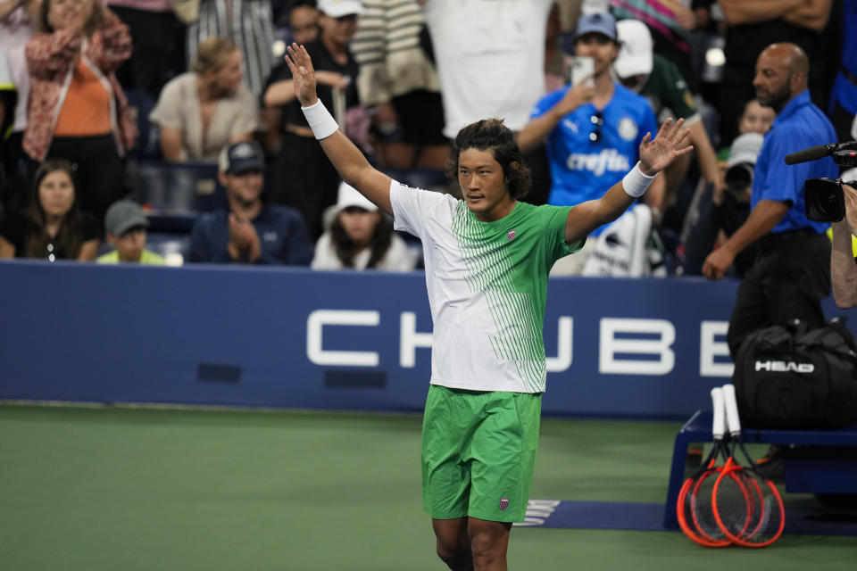 CORRECTS SPELLING TO ZHANG, INSTEAD OF ZANG - Zhang Zhizhen, of China, celebrates after winning a match against Casper Ruud, of Norway, during the second round of the U.S. Open tennis championships, Wednesday, Aug. 30, 2023, in New York. (AP Photo/Charles Krupa)