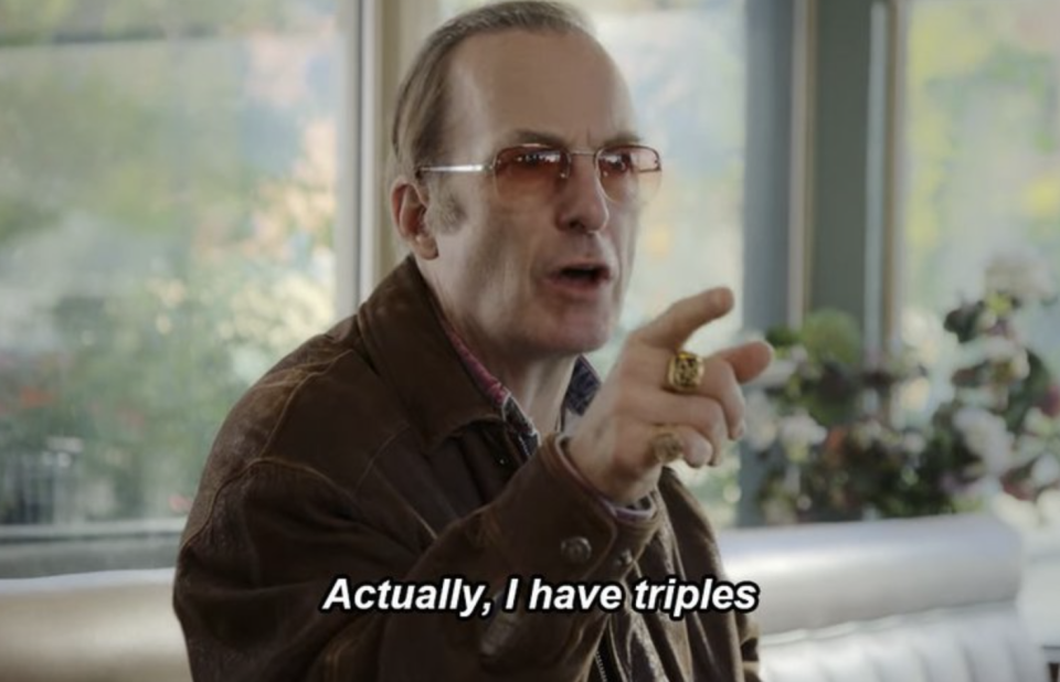 bob odenkirk wears transition sunglasses and a corduroy jacket. he points and says "actually, i have triples"