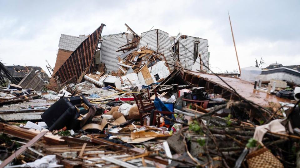 PHOTO: People begin clean up after a powerful tornado hit Greenfield on May 21, 2024. (Cody Scanlan/Des Moines Register via USA Today Network)