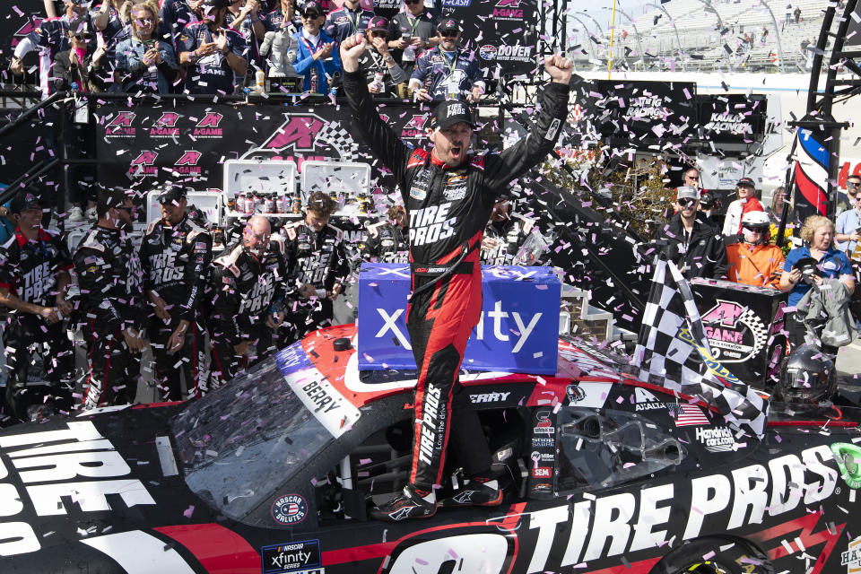 Josh Berry (8) celebrates in Victory Lane after winning the NASCAR Xfinity Series auto race at Dover International Speedway, Saturday, April 30, 2022, in Dover, Del. (AP Photo/Jason Minto)