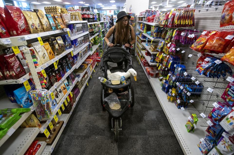 McWilliams shops with Cardi D at a CVS store in downtown Los Angeles.