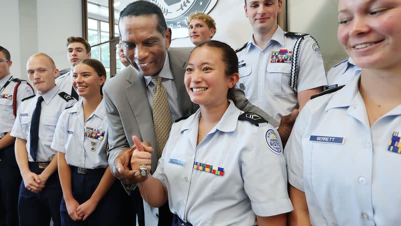 Rep. Burgess Owens, R-Utah, lets University of Utah Air Force Junior ROTC member Andrea Trinidad wear his Super Bowl ring after speaking at the Sutherland Institute’s 2023 Congressional Series at the University of Utah Hinckley Institute in Salt Lake City on Wednesday, Aug. 30, 2023.