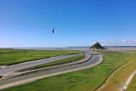 <p>Los que lo visitaron este 24 de mayo, además de contemplar la belleza de este lugar, también tuvieron la fortuna de ver a Paulin caminar sobre el cielo para completar su espectacular reto. (Foto: Damien Meyer / AFP / Getty Images).</p> 